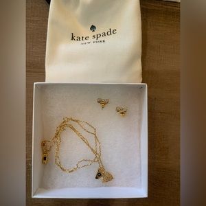 Kate Spade gold plated dog necklace and bow tie earrings